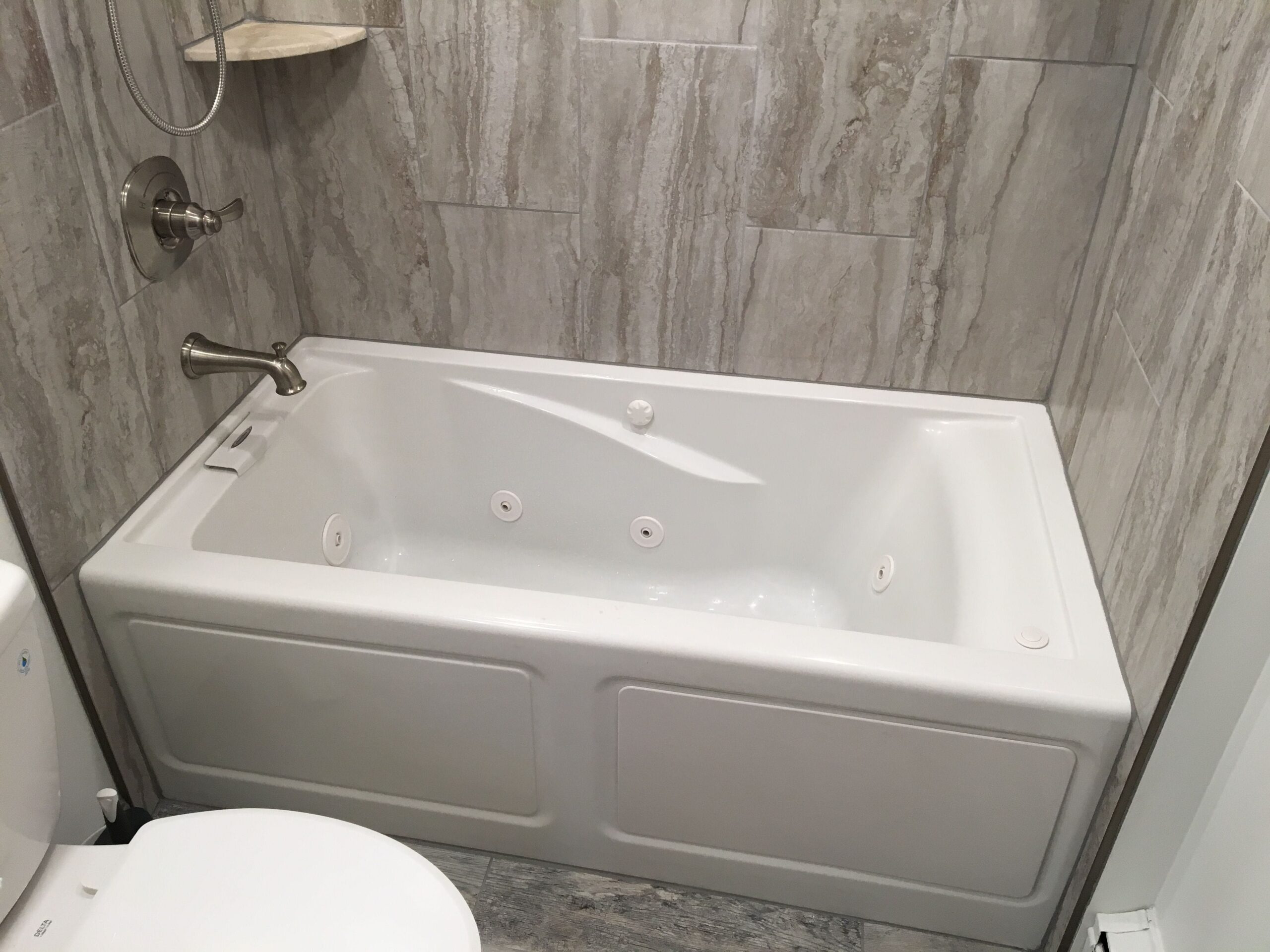 Bathtub after remodel and tile
